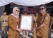 Dinas Dukcapil Kota Tidore Kepulauan Terima Sertifikat ISO 27001 dari Kementerian Dalam Negeri